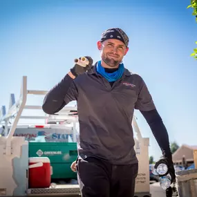 Canyon State install team member hauling equipment