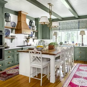 What a beautiful kitchen to entertain friends in. We specialize in custom kitchen remodels!