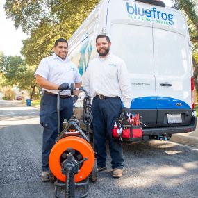 bluefrog Plumbing + Drain techs about to head out in the service van to a plumbing fixture installation and repair call in the North Dallas Frisco area.