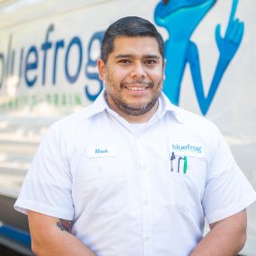 Technician heading out in a bluefrog Plumbing + Drain of North Dallas van for a leak detection and repair call in Highland Park.