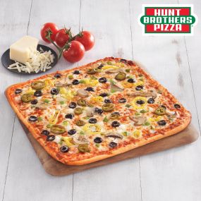 Hunt Brothers® Pizza Veggie Pizza on your choice of Original Crust or Thin Crust. Veggie Pizza is packed with ripe bell peppers, mushrooms, onions, black olives, banana peppers and an option of jalapeño peppers.
