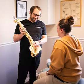 Dr. Michael Grocholski, Doctor of Chiropractic at Venice Spine and Disc in Venice, FL with a patient.