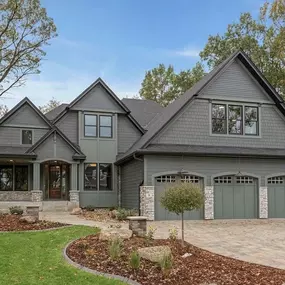 The dark exterior of this home is to die for. A bold but classic home trend that we at Hanson Builders just can't get enough of!