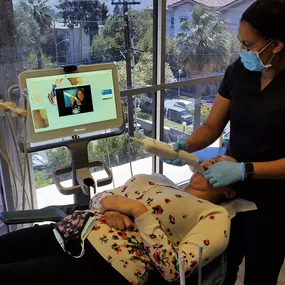 Doctor examining the oral health of a patient