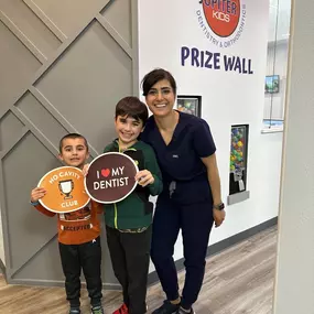 Dr. Elizabeth Kamali with her little patients at Jupiter Kids Dentistry & Orthodontics Of Allen, TX