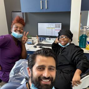 Dr. Adil Khan with his fellow colleagues at Davie Designer Dental Office