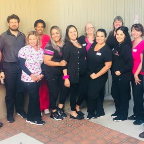 Dr Singh with his team at his dental office in glendale