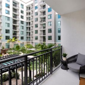 Balcony overlooking the pool at Camden Atlantic apartments in Plantation, Florida.