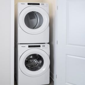 Full-size front loading washer and dryer at Camden Atlantic apartments in Plantation, Florida.