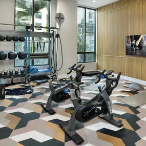 Yoga and spin studio with interactive fitness classes at Camden Atlantic apartments in Plantation, Florida.