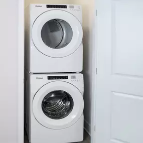 Full-size front loading washer and dryer at Camden Atlantic apartments in Plantation, Florida.