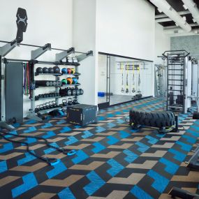 Camden NoDa apartments in Charlotte, large Athletic Club with strength training equipment