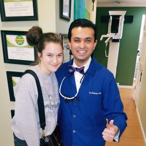 Dr. Patel and young girl patient