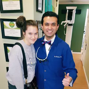 Dr. Patel and young girl patient