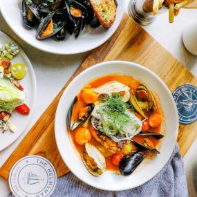The Helmsman table of entrees - pasta, clams & more