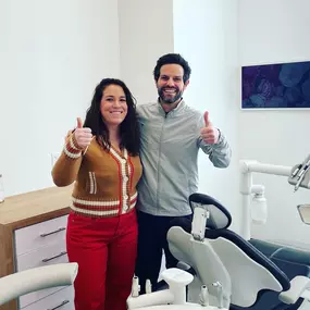 Dr. Pallotto and patient giving a thumbs up