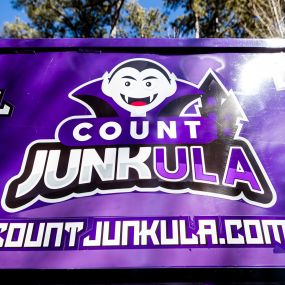 count junkula of raleigh junk removal dumpster logo