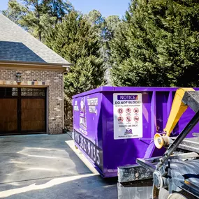 count junkula of raleigh purple dumpster rental