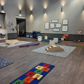 An indoor gym for young children at New Horizon Academy in Overland Park, KS.