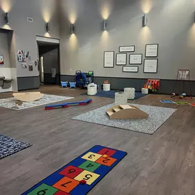 An indoor gym for young children at New Horizon Academy in Overland Park, KS.