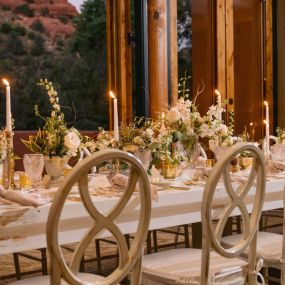 Wedding Table decorated with candles and flowers.