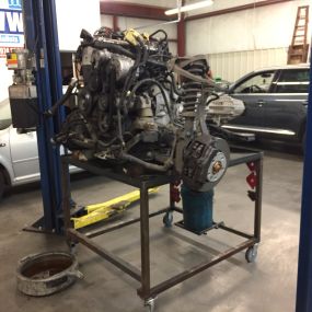 Volkswagen Touareg engine pulled out of the vehicle for timing chain repair.