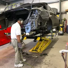 BigSky Collision Center - assessing damage and repair strategy.