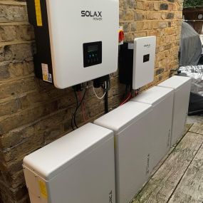 Hybrid Solar Inverter and four solar batteries on a somerset home