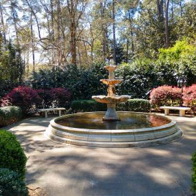 The surrounding 26-acre estate is open to the public for use as a natural preserve and park, with formal gardens designed by Alfred Yeomans, and is the gateway to the longleaf pine forest in the Boyd Tract of Weymouth Woods.