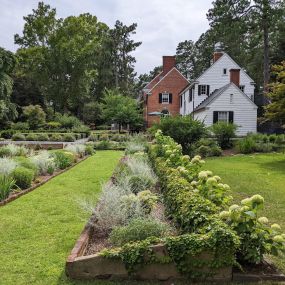 The surrounding 26-acre estate is open to the public for use as a natural preserve and park, with formal gardens designed by Alfred Yeomans, and is the gateway to the longleaf pine forest in the Boyd Tract of Weymouth Woods.