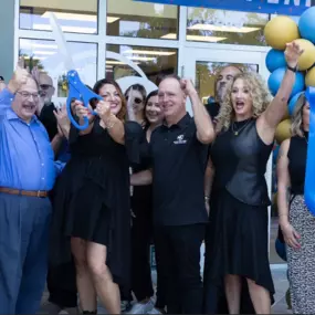 Hair Cuttery team and Mayor Greg Ross cheering at the grand opening in  Cooper City, FL.