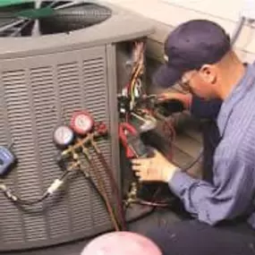 Technician working on HVAC repair