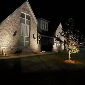 Home with exterior lighting