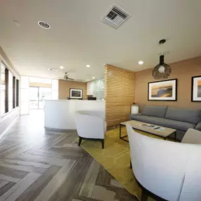 Resident Seating Area with Curved Charis and Couch