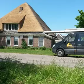 Nieuw rieten dak met dakkapel