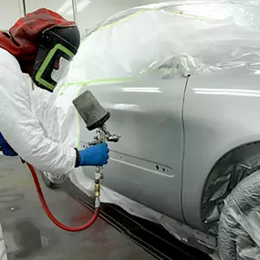 F.T. Auto Body Repair Shop- painting car