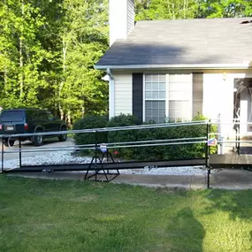 This wheelchair ramp in the Athens-area town of Winterville, Georgia, blends well with the lovely home and landscaping.