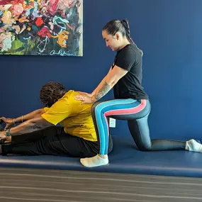 StretchLab Lake Murray Flexologist providing a 1:1 Assisted Stretch Session.