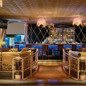 Bound is an elegant lobby bar at The Cromwell Las Vegas with an intimate vibe and a curated selection of craft cocktails and spirits. Try the Bound Old Fashioned or explore some of their other unique offerings to get your evening started. An elegant atmosphere permeates every inch of Bound. Subtle lighting, gold highlights, and plush seating creates an intimate scene while you sip on handcrafted cocktails.