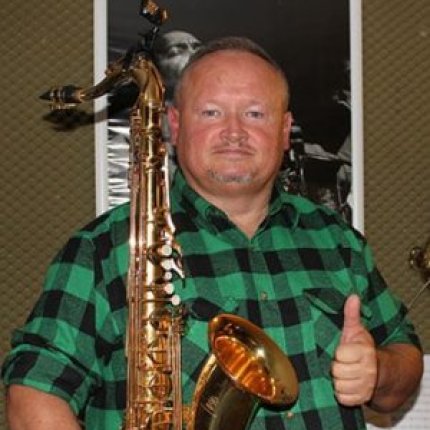 Logótipo de Saxophon Werkstatt in Münster, Werkstatt für Blech- und Holzblasinstrumente, An- und Verkauf