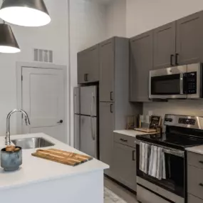 Energy-efficient stainless steel appliances and undermount sinks complete the perfect balance of elegance and practicality. Whether hosting guests or preparing a cozy meal, these kitchens are designed to impress.