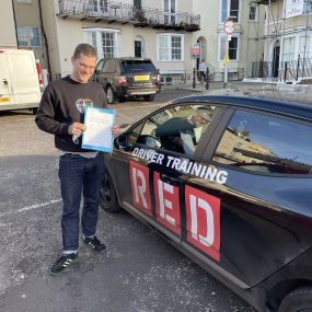 Bild von Phils Red Driving School