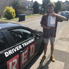 Bild von Phils Red Driving School