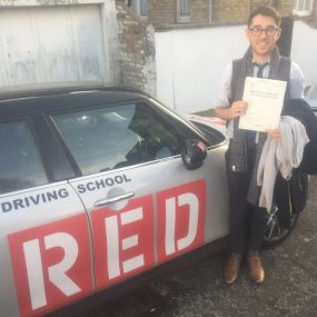 Bild von Phils Red Driving School