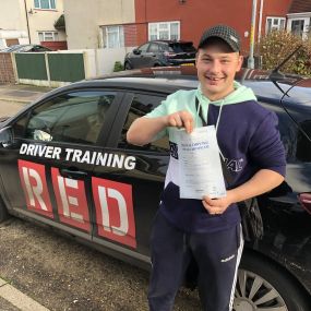 Bild von Phils Red Driving School