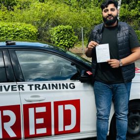 Bild von Phils Red Driving School