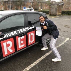 Bild von Phils Red Driving School