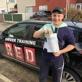 Bild von Phils Red Driving School
