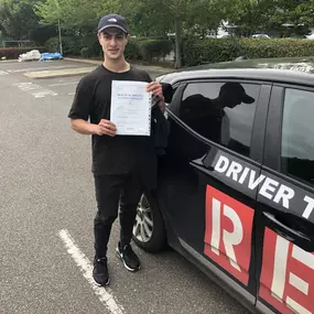 Bild von Phils Red Driving School