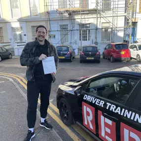 Bild von Phils Red Driving School